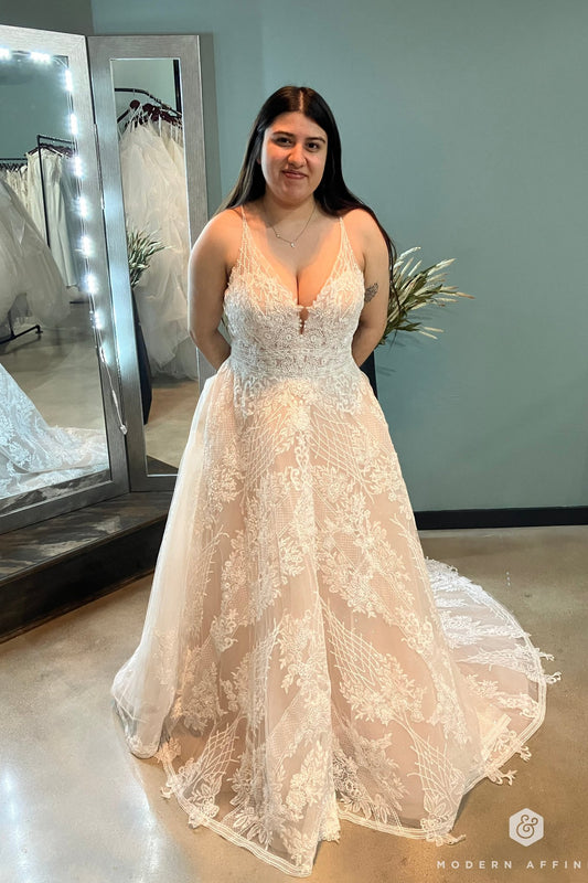 Model wearing discontinued Randy Fenoli wedding dress, Dallas.